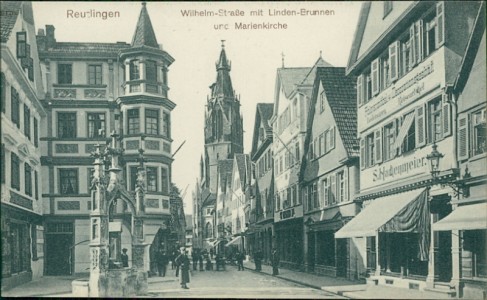 Alte Ansichtskarte Reutlingen, Wilhelm-Straße mit Linden-Brunnen und Marienkirche