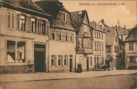 Alte Ansichtskarte Rüdesheim am Rhein, Teilansicht mit Bäckerei Herm. Veith